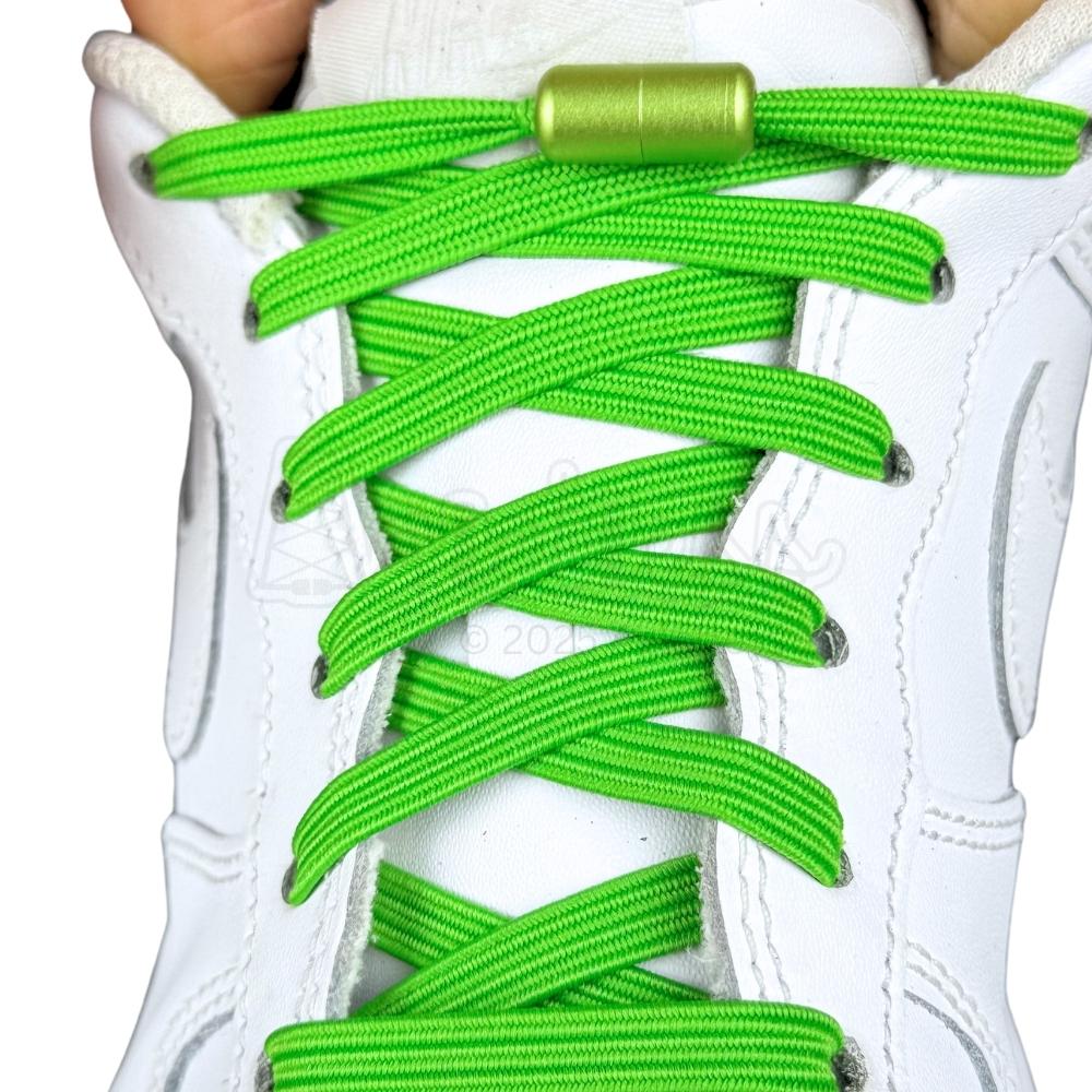 Elastische veters zonder strikken plat 7mm capsule sluiting appelgroen met stretch uitgerekt