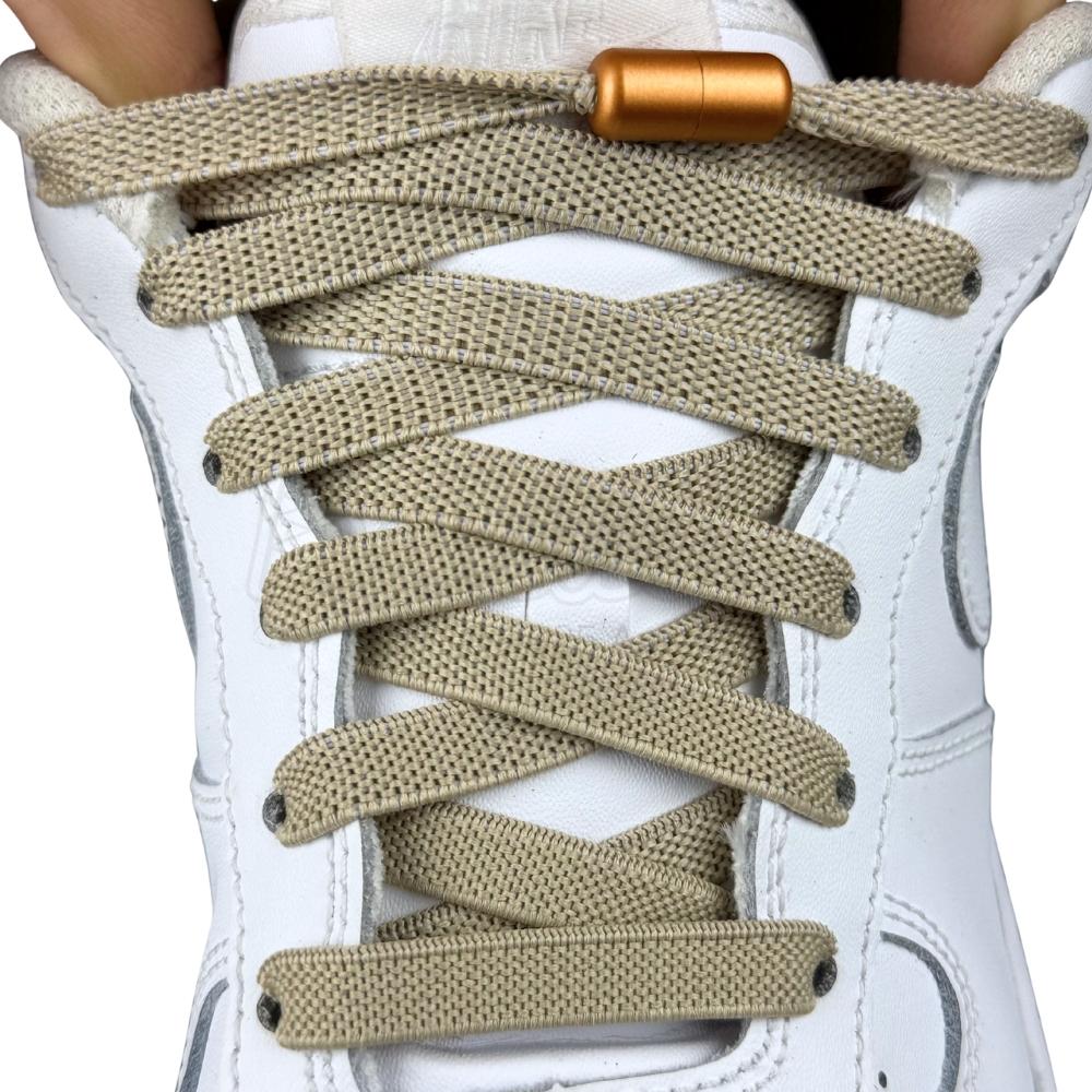 Elastische veters zonder strikken plat 9mm metalen draai capsule khaki met stretch uitgerekt