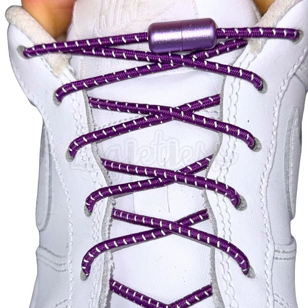 Elastische veters zonder strikken reflecterend 3mm capsule sluiting paars met stretch uitgerekt