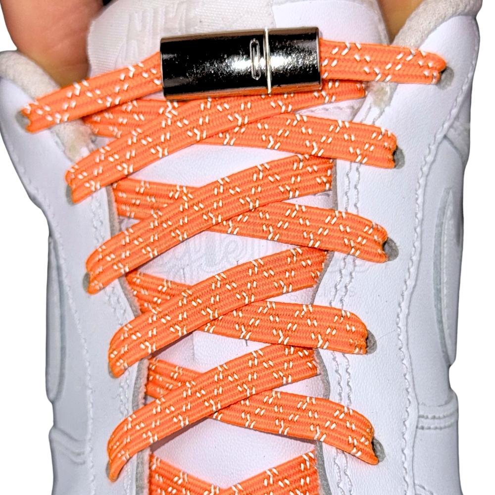 Elastische veters zonder strikken reflecterend 7mm magnetische sluiting oranje met stretch uitgerekt