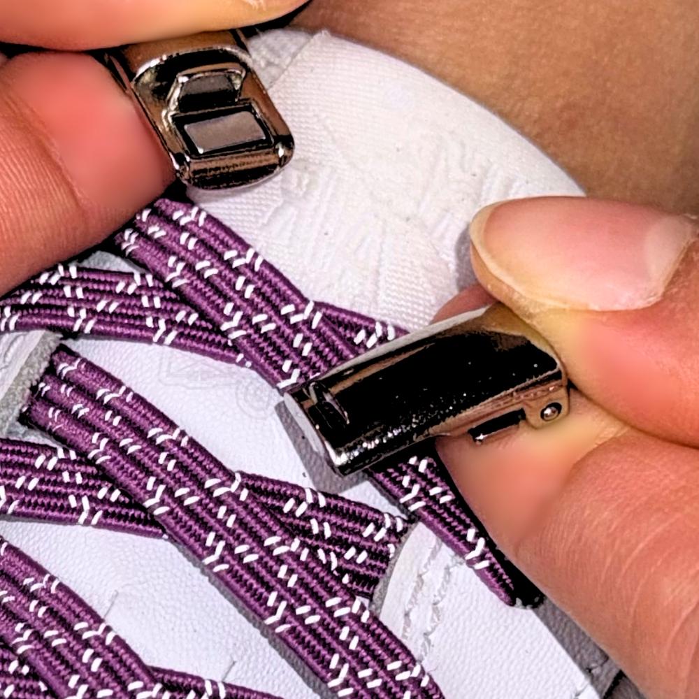 Elastische veters zonder strikken reflecterend 7mm magnetische sluiting paars detailfoto van hoe de sluiting werkt