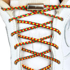 Elastische veters zonder strikken driehoek 3mm capsule sluiting rood geel groen met stretch uitgerekt