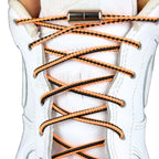 Elastische veters zonder strikken driehoek 3mm capsule sluiting zwart oranje met stretch uitgerekt