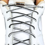 Elastische veters zonder strikken driehoek 3mm capsule sluiting zwart wit met stretch uitgerekt