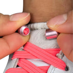 Elastische veters zonder strikken plat 7mm capsule sluiting oranjerood detailfoto van hoe de sluiting werkt