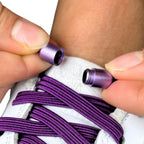 Elastische veters zonder strikken plat 7mm capsule sluiting paars detailfoto van hoe de sluiting werkt