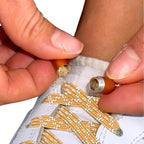 Elastische veters zonder strikken reflecterend 7mm capsule sluiting khaki detailfoto van hoe de sluiting werkt