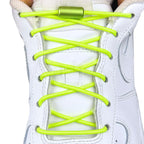 Elastische veters zonder strikken rond 3mm capsule sluiting fluorescerend groen met stretch uitgerekt