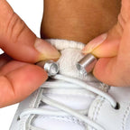 Elastische veters zonder strikken rond 3mm capsule sluiting wit detailfoto van hoe de sluiting werkt