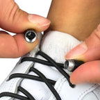 Elastische veters zonder strikken rond 3mm capsule sluiting zwart detailfoto van hoe de sluiting werkt