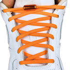 Elastische veters zonder strikken rond 5mm capsule sluiting oranje met stretch uitgerekt