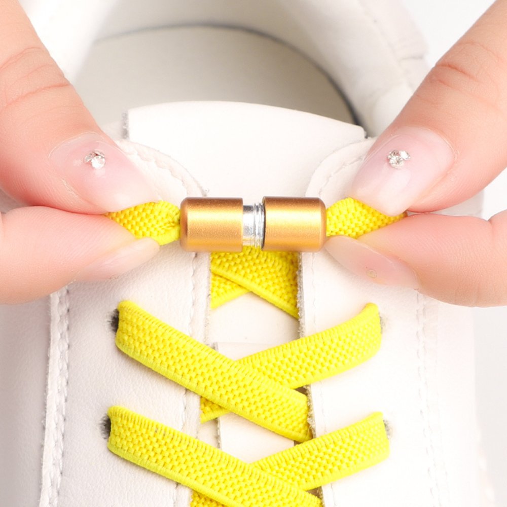 flat-elastic-no-tie-shoelaces-yellow-twist-capsule-displayed-on-sneaker-display