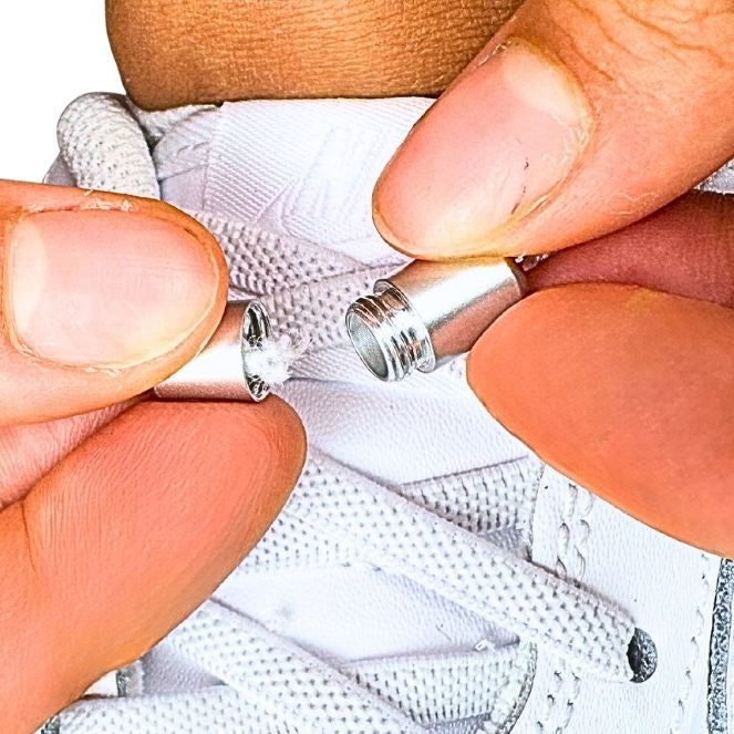 Hoe werken elastische veters met capsule sluitsysteem stap 3 witte elastische veters in nike schoenen
