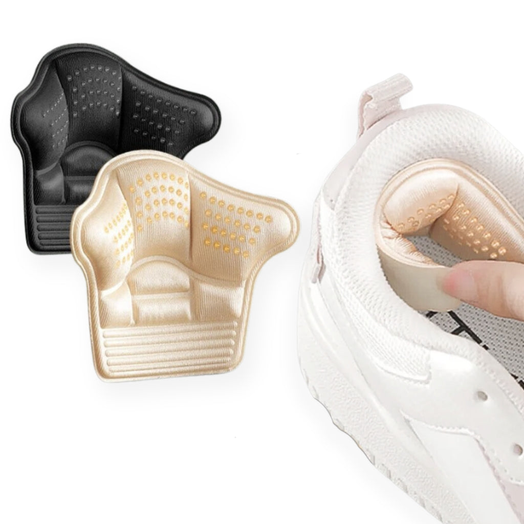 Zwarte en beige hielHielbeschermers antislip kussen naast schoen waarin het wordt geplaatst.